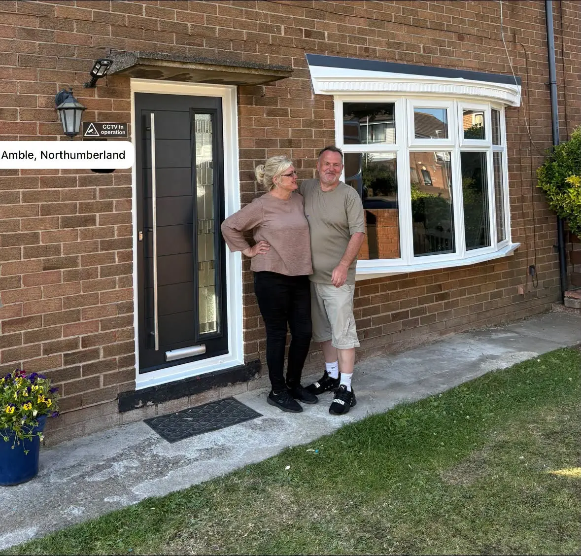 Black composite door and bow window installed in Amble, Northumberland