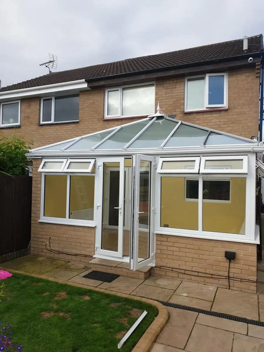 White conservatory with glazed roof