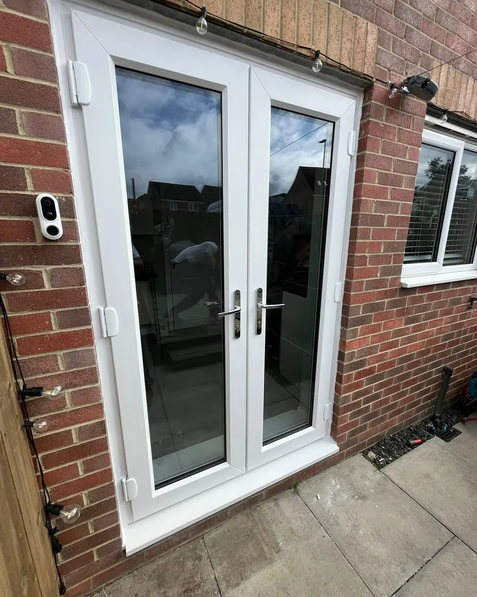 White French doors installed by Window Warriors