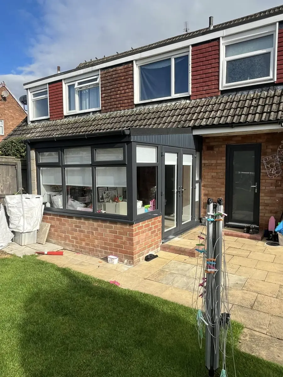 House fitted with dark replacement windows
